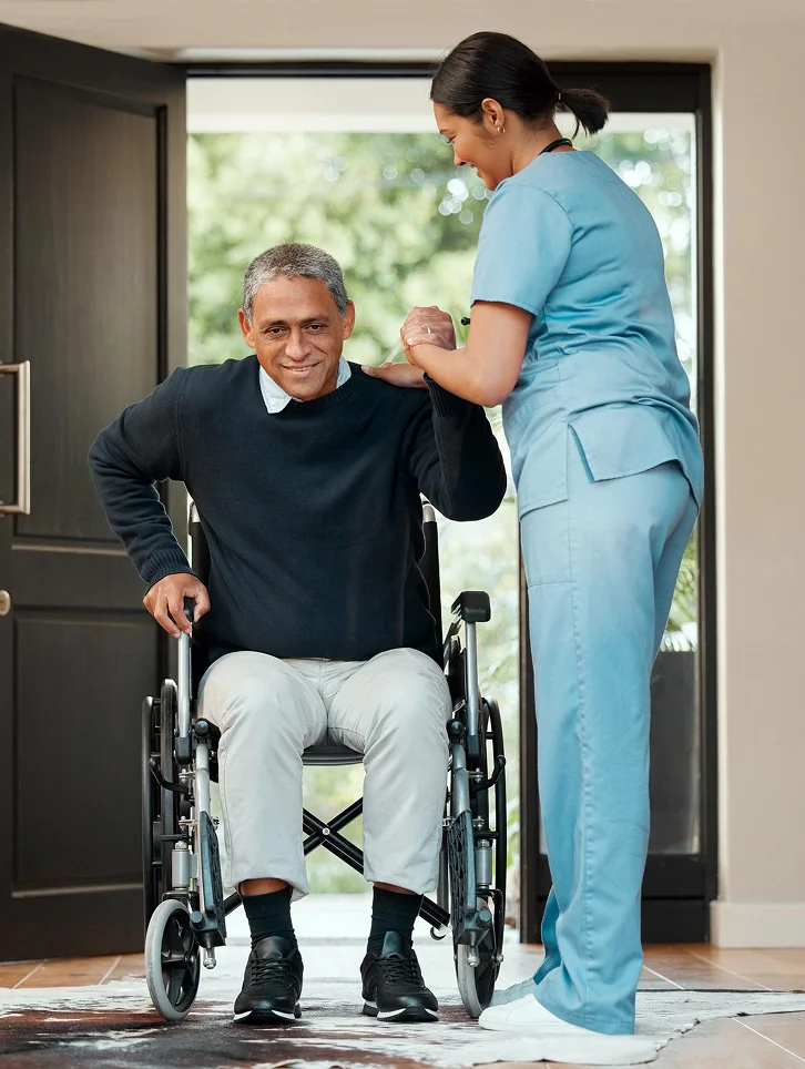 Caregiver reviewing care information with an elderly man