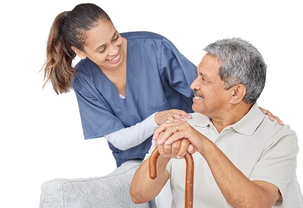 Caregiver supporting an elderly man with mobility