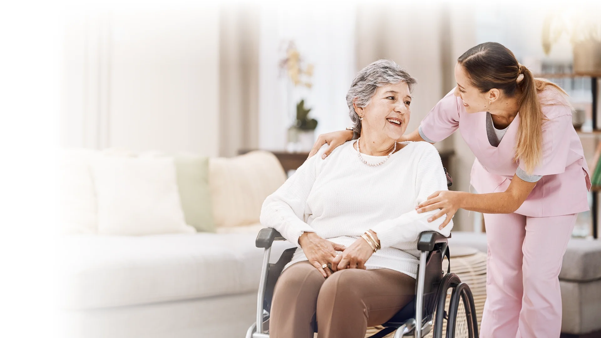 Caregiver providing compassionate support to a senior woman
