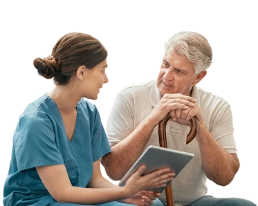 Caregiver reviewing a care plan on a tablet with a senior man holding a cane