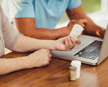 Caregiver assisting a senior with foot care