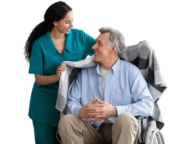 Caregiver assisting a senior man in a wheelchair